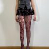 Spring and summer thin niche love pattern asymmetrical fishnet modern lace splicing hollow pantyhose