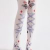 Poker style strappy printed pantyhose