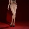 Women's bare legs slim shiny pantyhose
