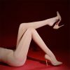Women's bare legs slim shiny pantyhose